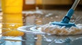 Mopping the floor with white mop and cleaning foam. Royalty Free Stock Photo