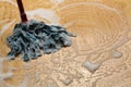 Mopping wooden floor Royalty Free Stock Photo