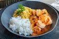 Moqueca de Camarao - Brazilian shrimp in coconut milk and palm oil. Accompanies manioc flour and rice. Bahia food