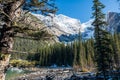 Moraine lake in autumn sunny day. Snow-capped mountains. Banff National Park, Alberta, Canada. Royalty Free Stock Photo