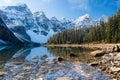 Moraine lake in autumn sunny day. Snow-capped mountains. Banff National Park, Alberta, Canada. Royalty Free Stock Photo