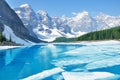 Moraine lake under the ice at morning spring time. Banff National park Royalty Free Stock Photo