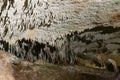 Moravian Karst. Stalactites, stalagmites and streak formations in cave of Balzarca. Royalty Free Stock Photo