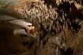 Moravian Karst. Stalactites, stalagmites and streak formations in cave of Balzarca. Royalty Free Stock Photo