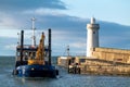 This is the Moray Council owned Dredger boat called Selkie arriving back at Buckie