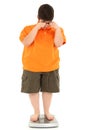 Morbidly Obese Fat Child on Scale Royalty Free Stock Photo