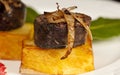 Morcilla on confit potato with onion