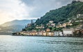 Morcote lakeside village scenic townscape view taken from Lake Lugano and dramatic light in Ticino Switzerland