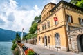 Morcote town hall orange building on the shore of Lake Lugano in Morcote Ticino Switzerland