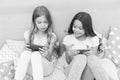 We are more connected than ever. Little children use mobile phone in bed. Mobile communication. Cellular communication