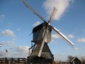 More contemporary windmill situated in the old farm by the Kinderdijk near Rotterdam, The Netherlands Royalty Free Stock Photo