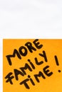 More family time handwriting text close up isolated on orange paper with copy space Royalty Free Stock Photo