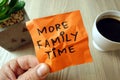 More family time - motivational reminder handwritten on sticky note