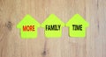 More family time and support symbol. Concept words More family time on green papers on wooden clothespins. Beautiful wooden Royalty Free Stock Photo