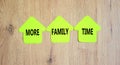 More family time and support symbol. Concept words More family time on green papers on wooden clothespins. Beautiful wooden Royalty Free Stock Photo
