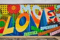 More Love graffiti mural abstract, vibrant colors with words and letters, wall in Muncie, IN Royalty Free Stock Photo