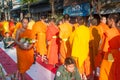More monks with give alms bowl which came out of the offerings in the morning at Buddhist temple, Culture Heritage Site