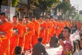 More monks with give alms bowl which came out of the offerings in the morning at Buddhist temple, Culture Heritage Site