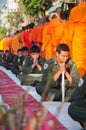 More monks with give alms bowl which came out of the offerings in the morning at Buddhist temple, Culture Heritage Site