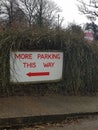 More parking this way sign. Royalty Free Stock Photo