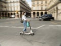 PARIS, FRANCE - SEPTEMBER 03, 2020: More people use the bike or the Electric Scooter to get around town
