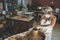 More than a pot, its pure art. a young woman working with clay in a pottery studio. Royalty Free Stock Photo