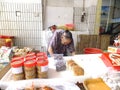 The more than and 90 year old Chinese old lady, sale of goods in the market