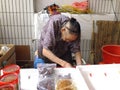 The more than and 90 year old Chinese old lady, sale of goods in the market