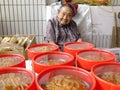 The more than and 90 year old Chinese old lady, sale of goods in the market