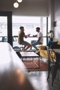 The more time we spend together, the closer we get. two young men talking while having coffee together in a cafe. Royalty Free Stock Photo