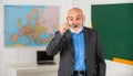 More tools introduced into everyday classrooms. Senior man teacher at chalkboard. Back to school. Teacher old school Royalty Free Stock Photo