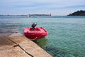 Mored boat at pier by high tide in France