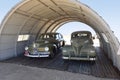 Moreno Valley, CA - February 26, 2022 - Authentic WW II staff cars parked under quanset hut at March Field Museum.