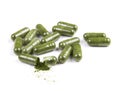 Moringa capsule pills on white background