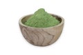 Moringa leaf powder in a wooden bowl on a white background Royalty Free Stock Photo