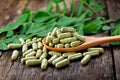 Moringa leaves and capsules Royalty Free Stock Photo