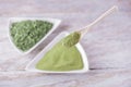 Moringa powder in spoon Royalty Free Stock Photo