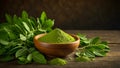 moringa powder in wooden bowl, fresh leaves