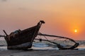 Morjim, North GOA, India , 29 March 2016: boat stands on the shore at sunset Royalty Free Stock Photo