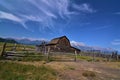 Mormon Row barn and rustic fencing Royalty Free Stock Photo