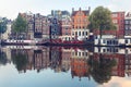 Morning Amsterdam canal with dutch houses Royalty Free Stock Photo