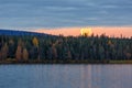 Morning autumn landscape with full moon and lake Royalty Free Stock Photo