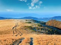 Morning autumn mountain road view and Cross Royalty Free Stock Photo