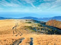 Morning autumn mountain road view and Cross Royalty Free Stock Photo