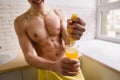Morning, awakening, fit man drinking orange juice Royalty Free Stock Photo