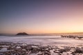 Morning at beach. Long exposure at the sea. Milky sunrise, Corralejo, Canary Islands, Spain