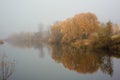 Morning Beautiful colored trees with lake in autumn, landscape photography. Late autumn and early winter period. Outdoor and natur Royalty Free Stock Photo