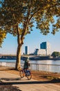 Morning bicycle ride on the bank of Rhein River in Cologne, Germany