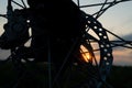 Morning bike ride, disc brakes silhouette closeup