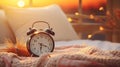 Morning bliss closeup alarm clock with happy woman stretching in bed, embracing sunlight Royalty Free Stock Photo